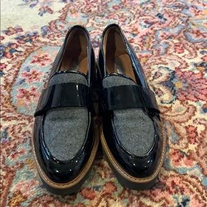 Black and grey patent leather loafers